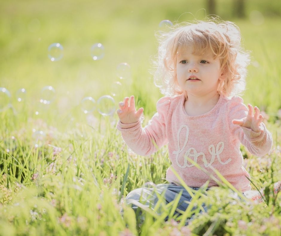 Child paying with bubble